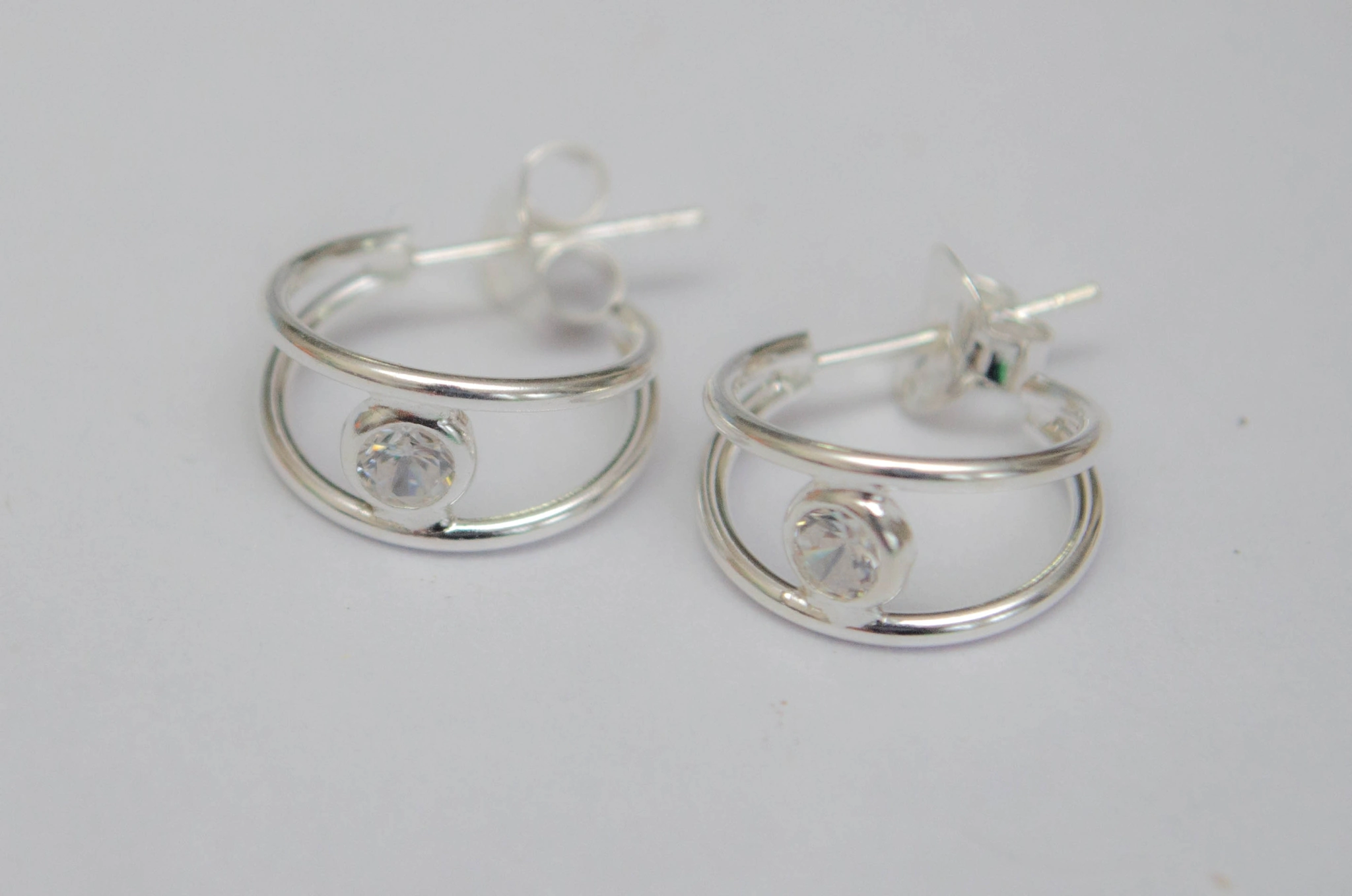 AR1005 Aros doble argolla cubic 1.3cm