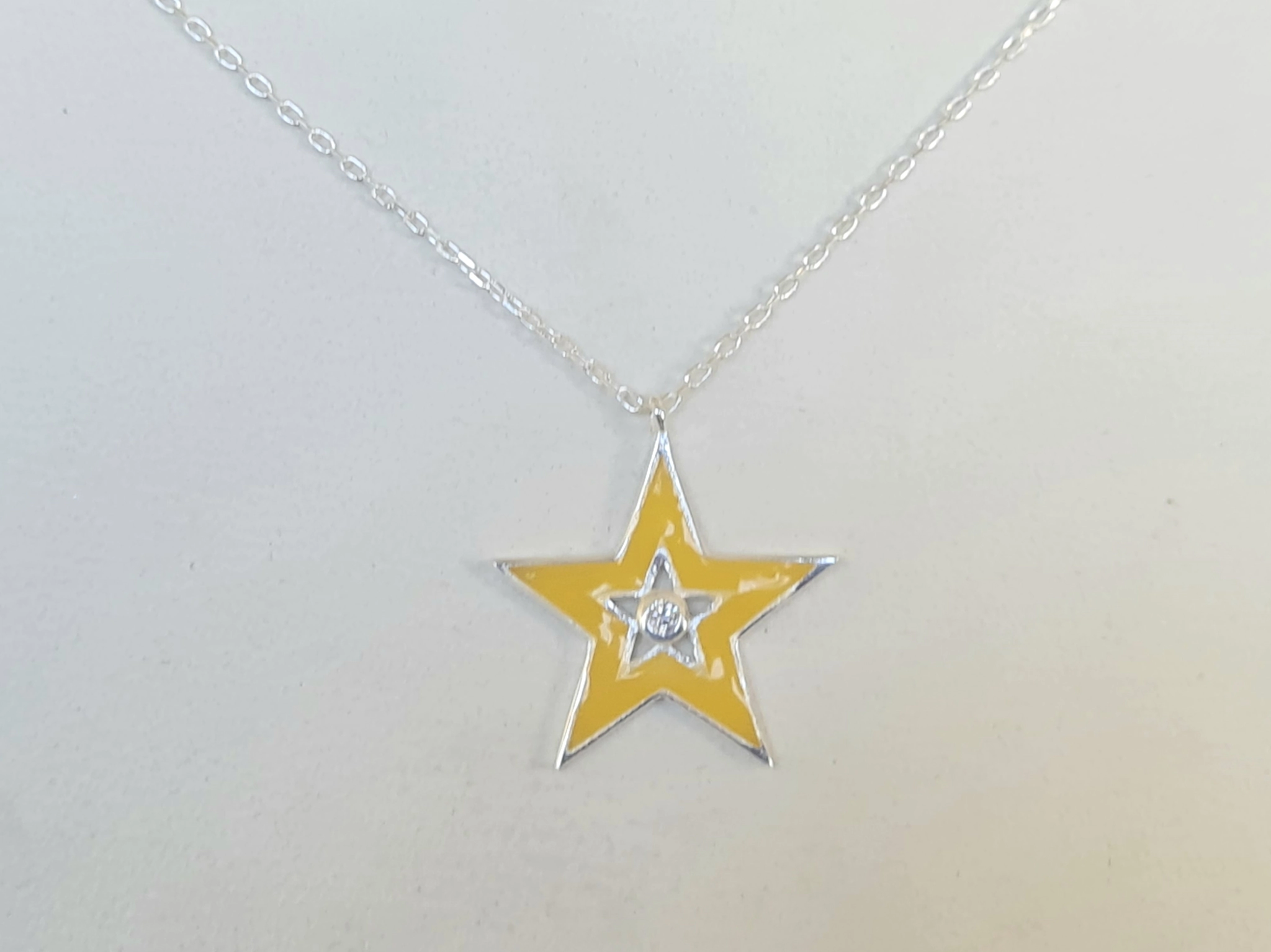 CA966 Cadena con dije estrella amarillo 42+3cm