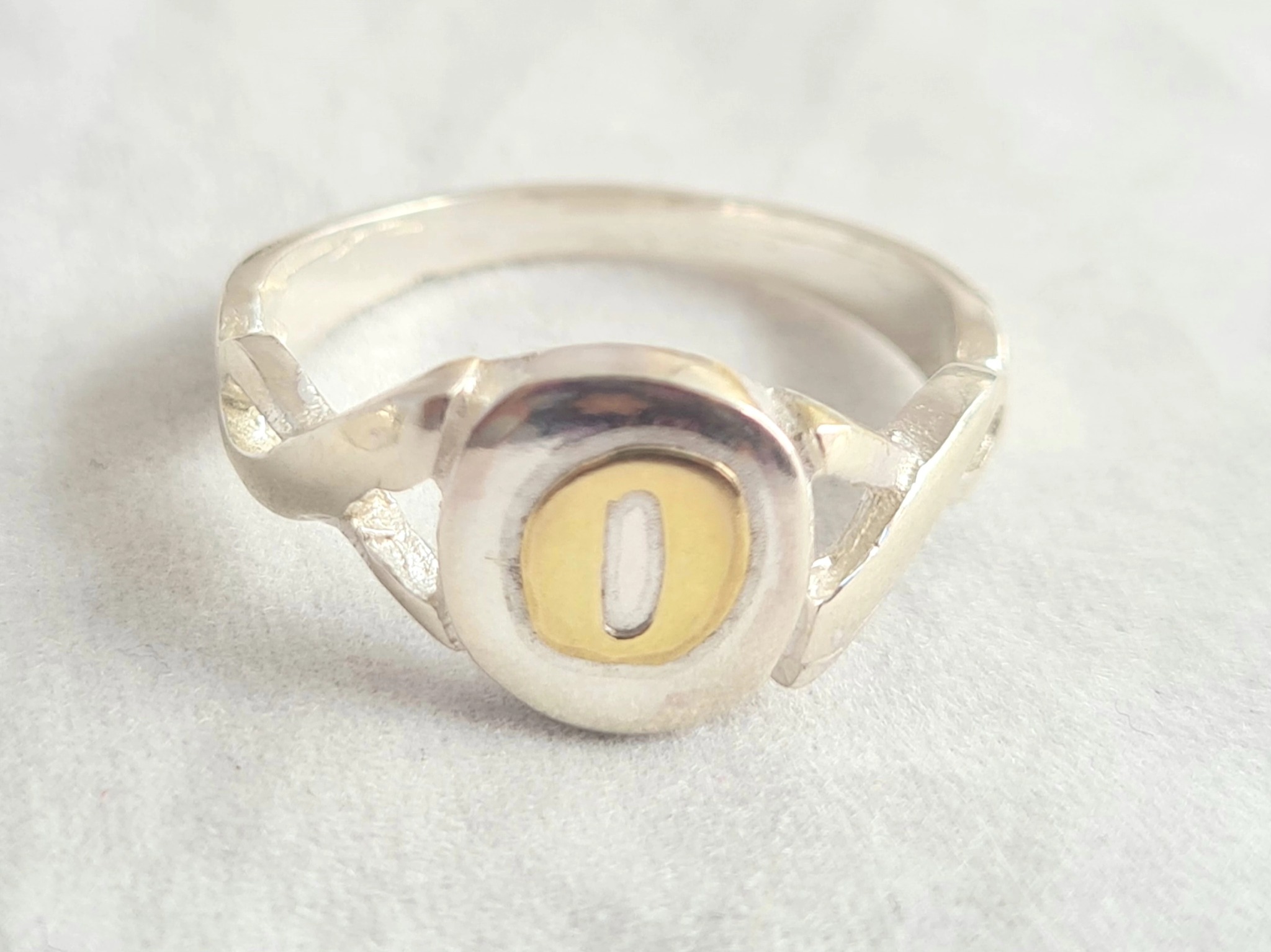 ANI989 Anillo inicial con DUBL - O