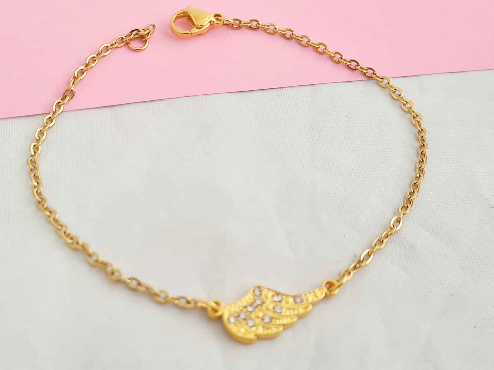 ADP0112 Pulsera con dije ala micropav 20cm