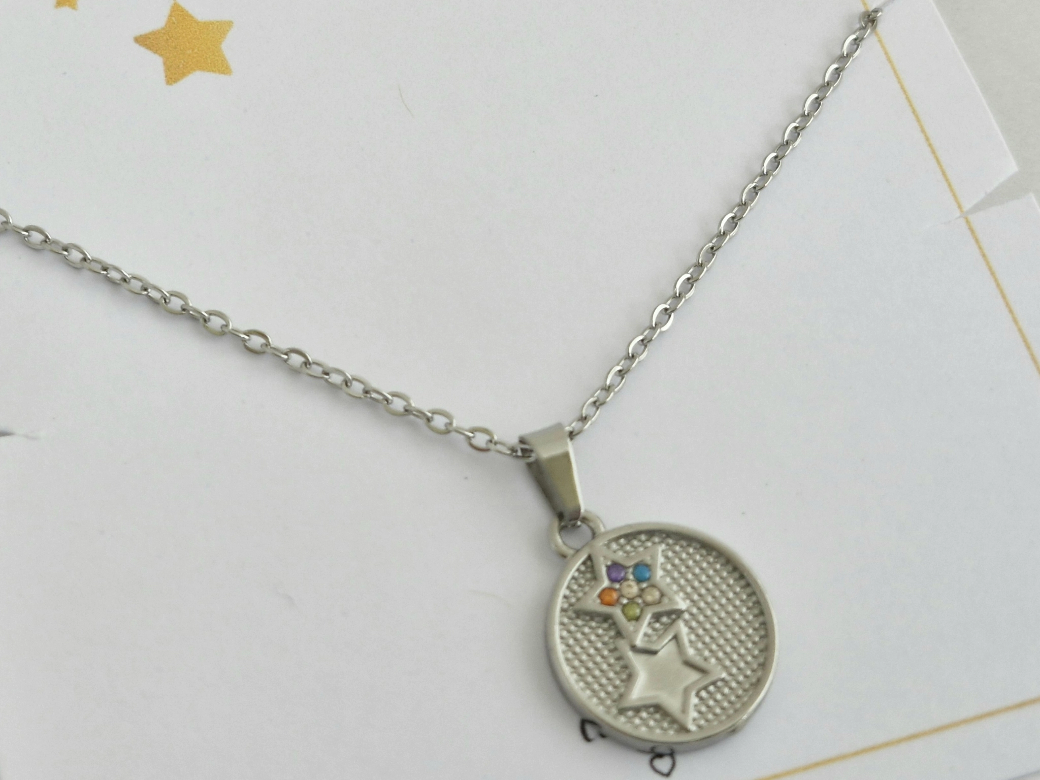 AQ-SET0336 Cadena con medalla estrellitas cubics 50cm