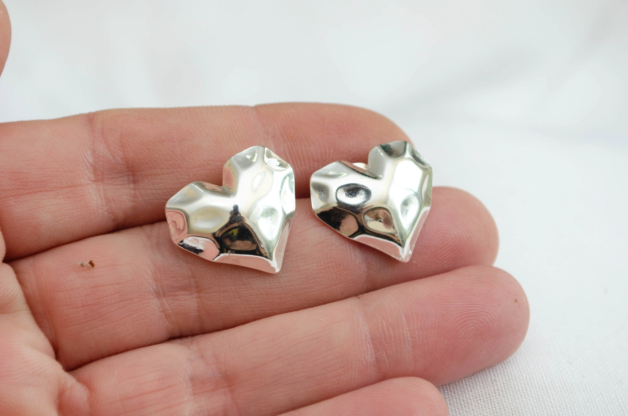ABA4578 Aros corazn golpeado 2cm
