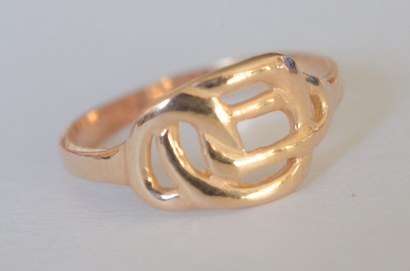 ANI225 Anillo laminado oro nudo - 