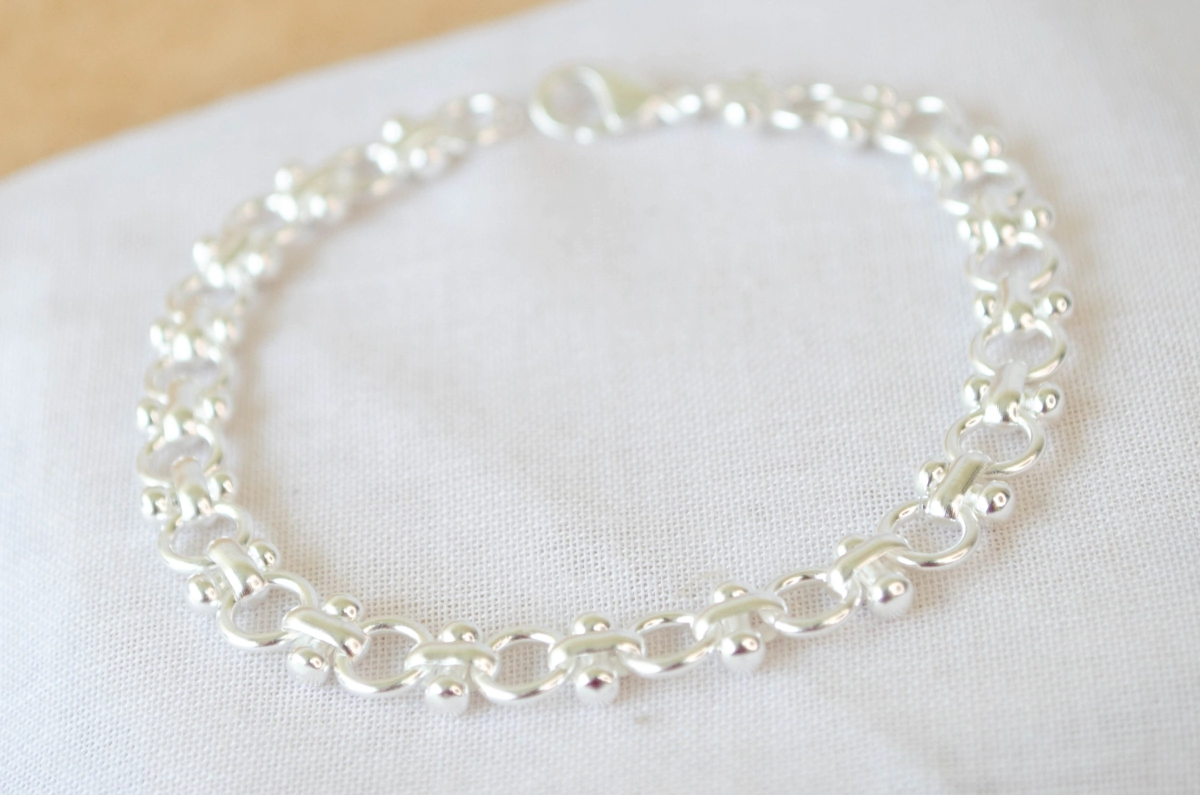 L-PU0015 Pulsera circulos palitos 18cm