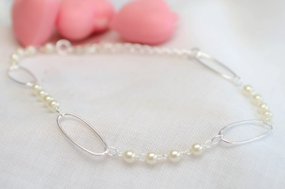 L-PU0058 Pulsera ovalos perlas 19+5cm