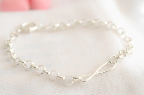 PU1283 Pulsera rolo con infinito centro largo 20cm