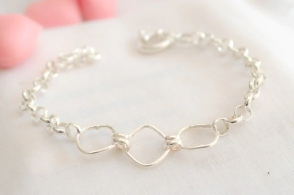 PU1287 Pulsera rolo rombos