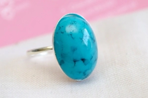 L-AN0118 Anillo simil piedra forma OVALO CELESTE