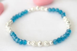 L-PU0125 Pulsera elastizada cristales BOLITAS celestes