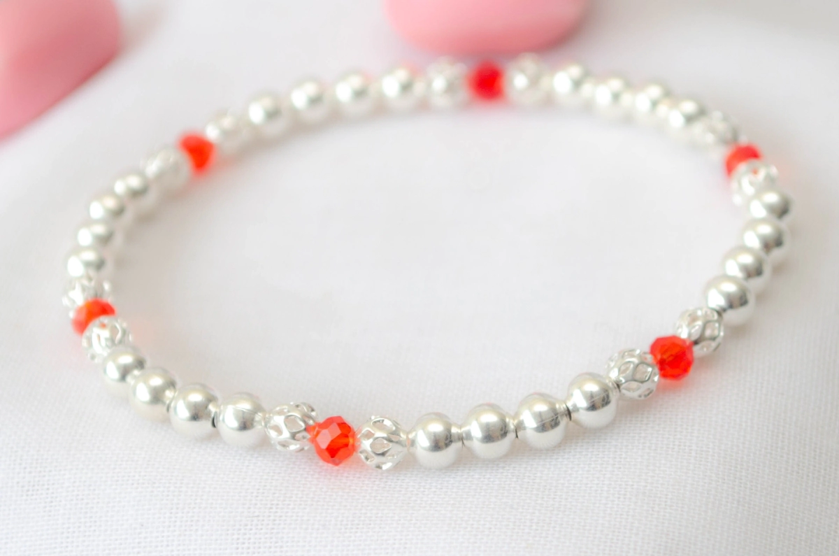 L-PU0127 Pulsera elastizada BOLITAS con cristales ROJOS