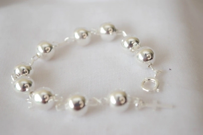 FF-0075 SOBRE Pulsera bolas 8mm con cruz