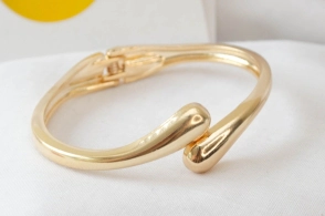 FF-0118 SOBRE pulseras DORADAS 2 GOTAS