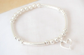 L-PU0165 Pulsera elastizada tubos bolitas corazon centro