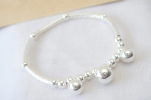 L-PU0169 Pulsera elastizada tubo bolitas