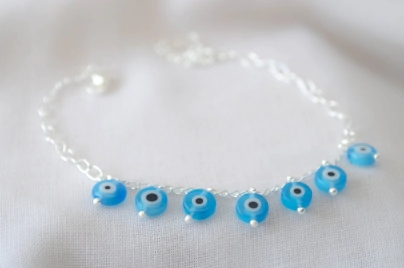 L-PU0187 Pulsera ojitos cubics