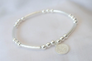 L-PU0197 Pulsera elastizada tubos bolitas San Benito