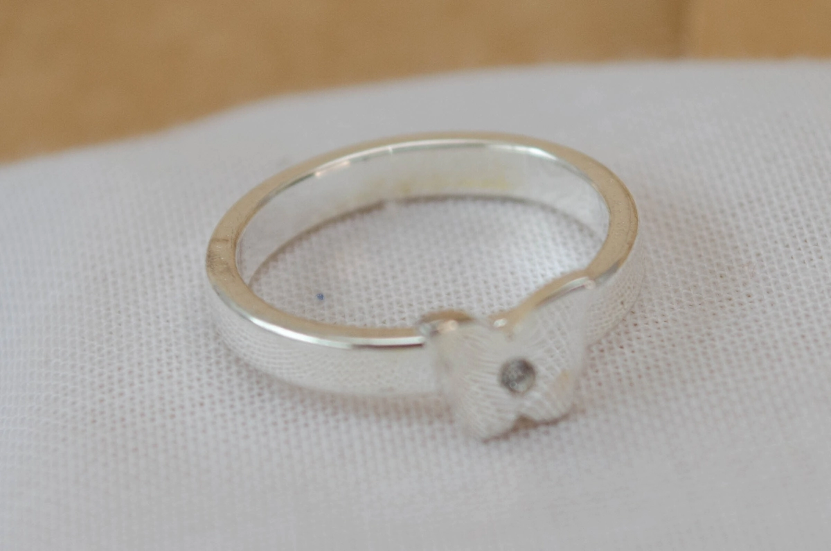 ABAN0006 Anillo mariposa centro cubic 