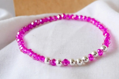 L-PU0202 Pulsera cristales bolitas FUCSIA
