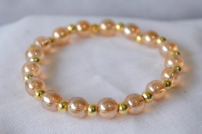 f-PU201 Pulsera elastizada perlas vidrio bolas doradas champagne