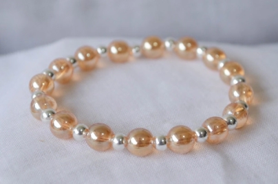 L-PU0203 Pulsera elastizada perla vidrio bolitas champagne