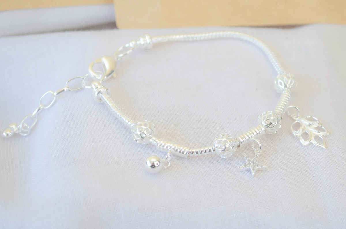 L-PU0204 Pulsera rosa con dijes