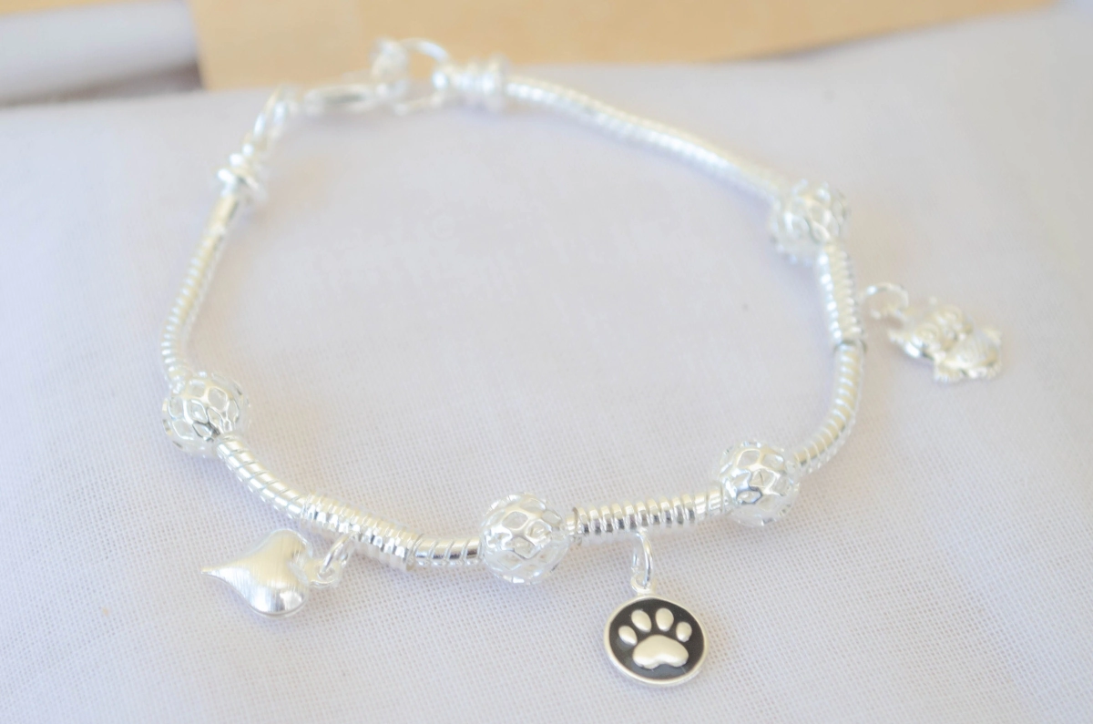 L-PU0205 Pulsera rosa con dijes