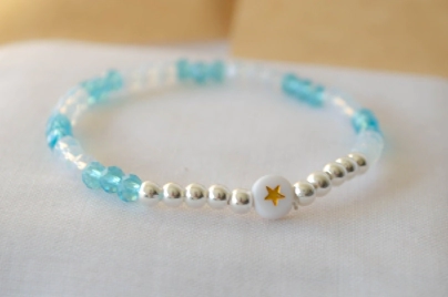 L-PU0217 Pulsera MUNDIAL cristales bolitas centro circulo estrella