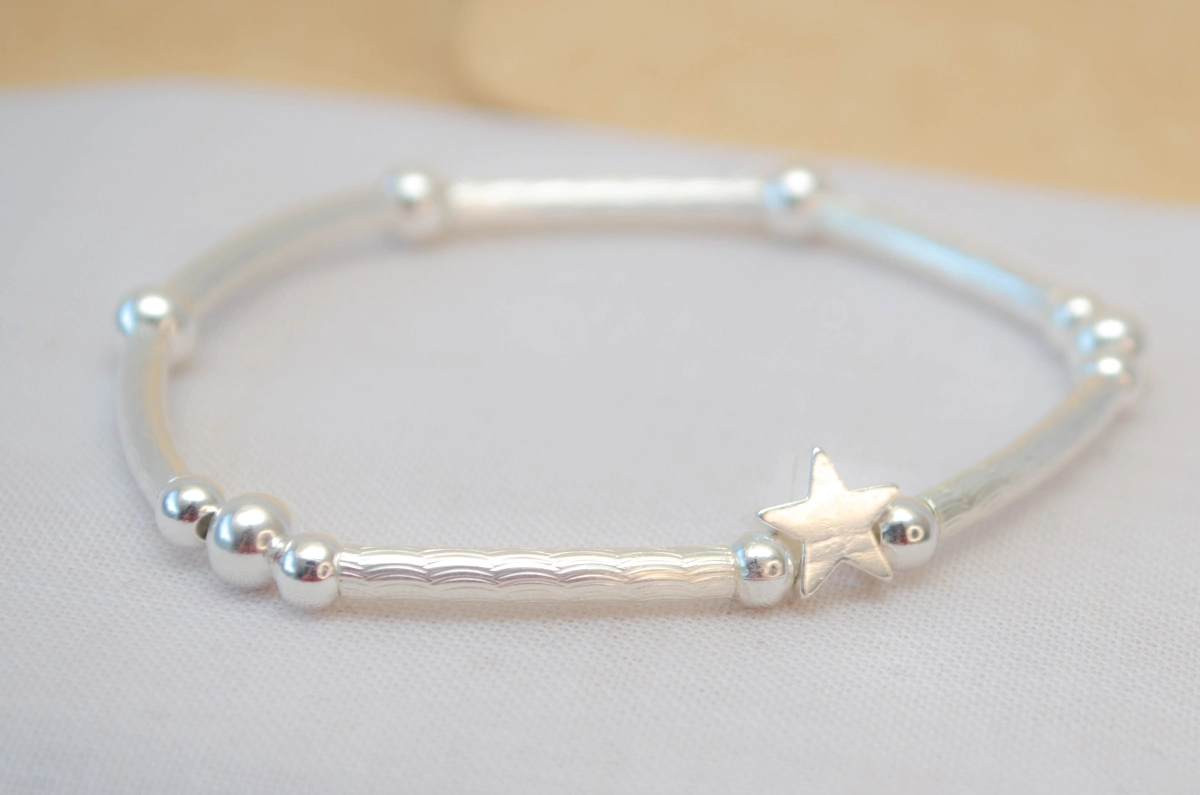 L-PU0219 Pulsera tubo bolitas estrella