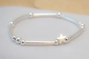 L-PU0219 Pulsera tubo bolitas estrella