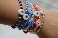 L-PU0227 Pulsera cristal centro ceramica ojo NUDE