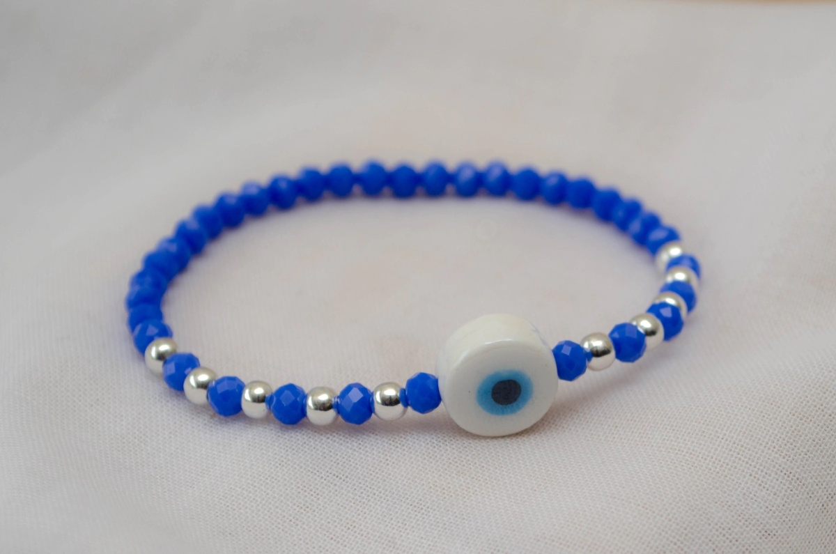 L-PU0227 Pulsera cristal centro ceramica ojo AZUL