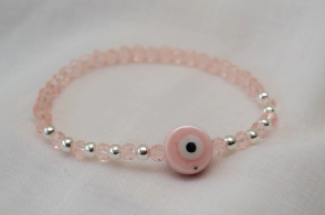 L-PU0227 Pulsera cristal centro ceramica ojo ROSA