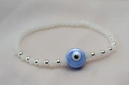 L-PU0227 Pulsera cristal centro ceramica ojo BLANCO
