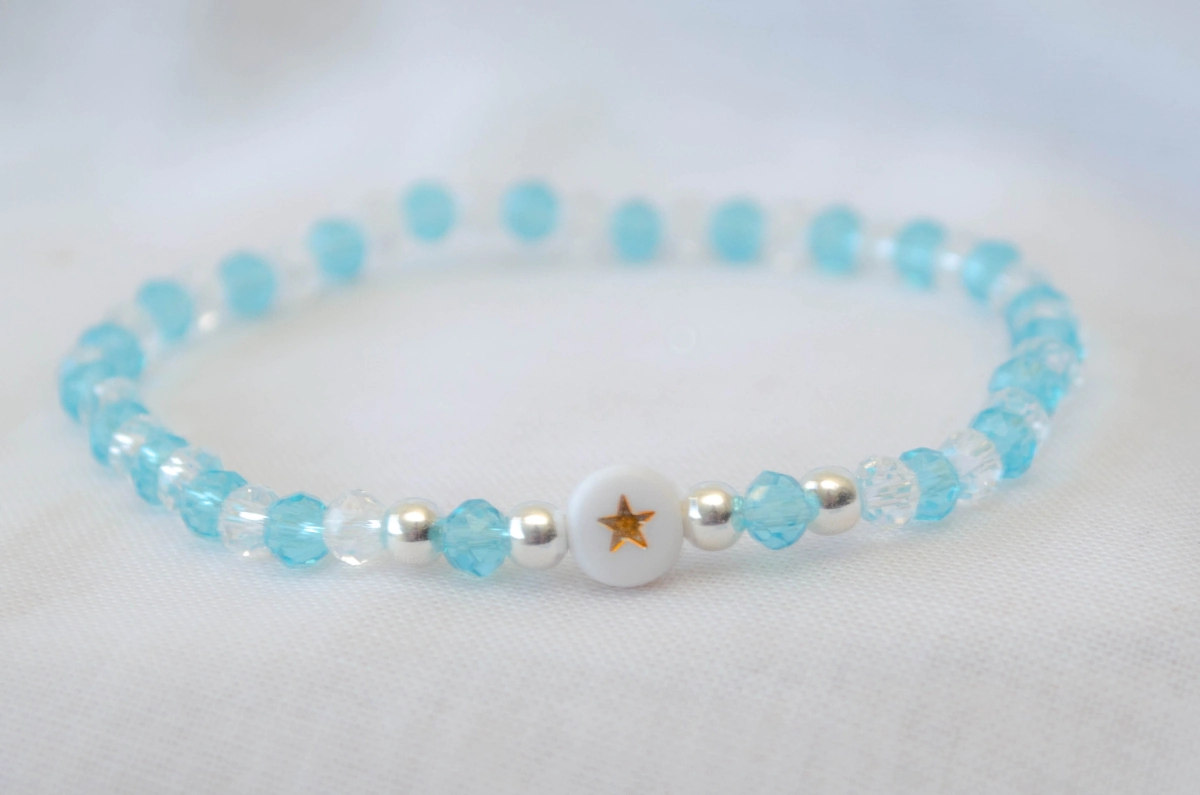 L-PU0228 Pulsera cristales celeste y blanco 1 estrella