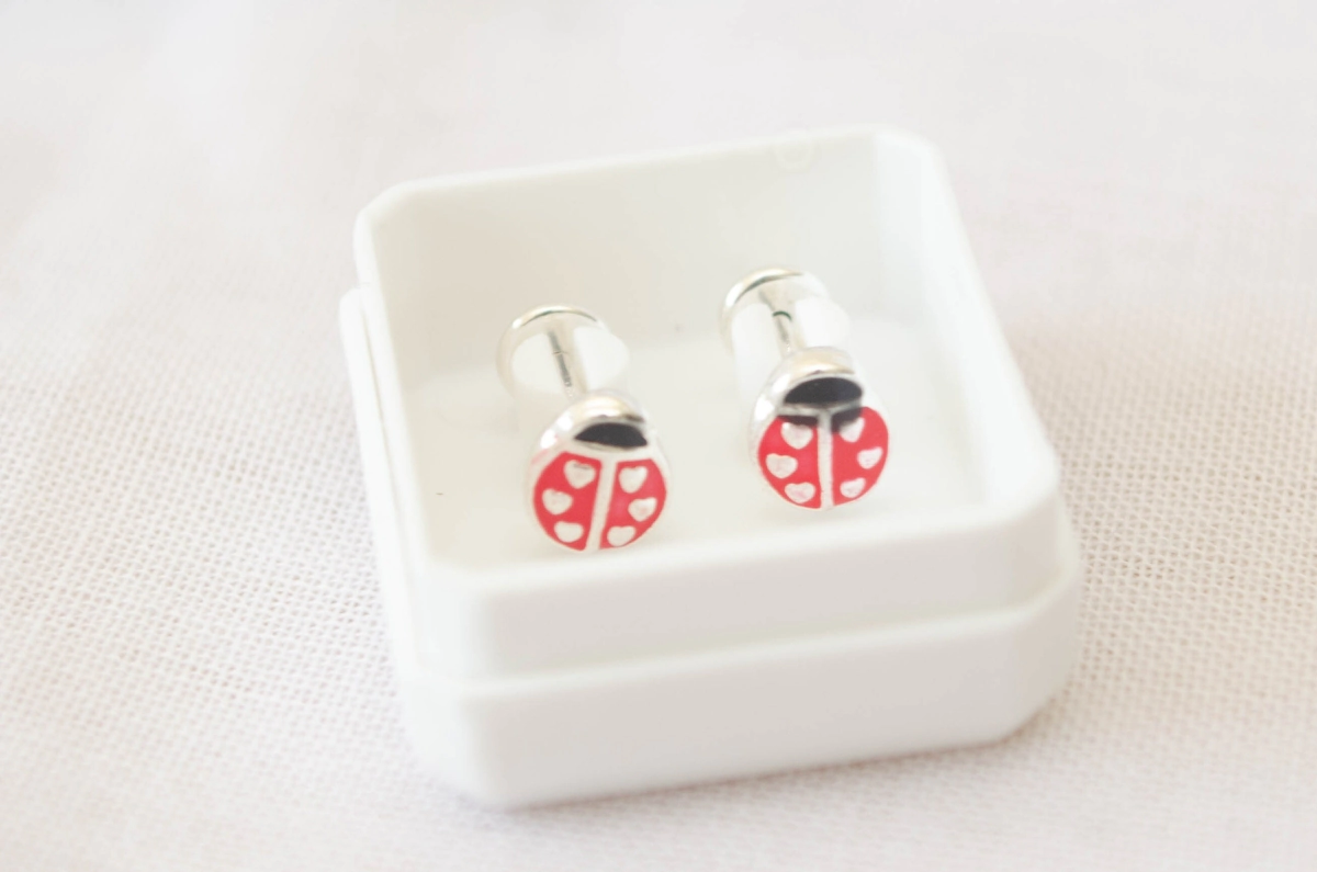 ABRI1537 Aros abridores vaquitas esmalte ROJO