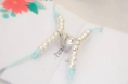 AMI0019 Setx2 pulseras hilo bolitas coraz�n imantado CELESTE
