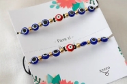 AMI0032 SET X 2 Pulseras ojitos turcos centro ojito COLOR SRTIDO