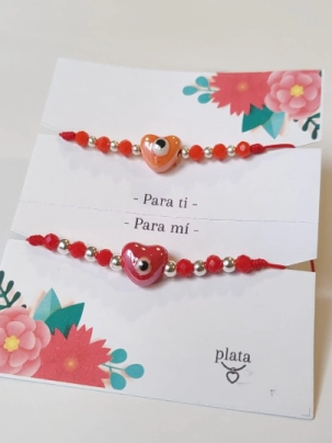 AMI0041 Setx2 pulseras hilo chino rojo CORAZON ceramica bolitas rojo y naranja