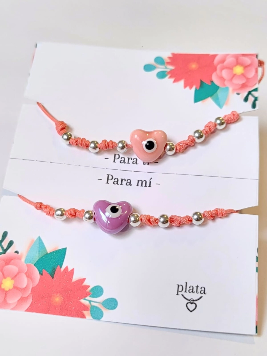AMI0040 Setx2 pulseras hilo chino rosa CORAZON ceramica lila y rosa bolitas