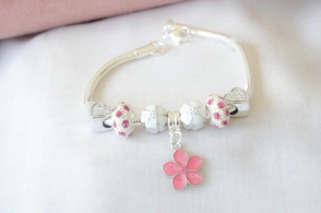 ABP0023 Pulsera tipo pandora dijes FUCSIA