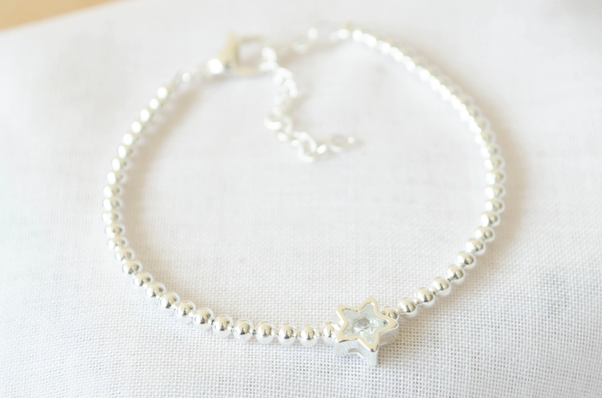 ABP0027 Pulsera bolitas centro estrella cubic 18+5cm