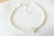 ABP0027 Pulsera bolitas centro estrella cubic 18+5cm