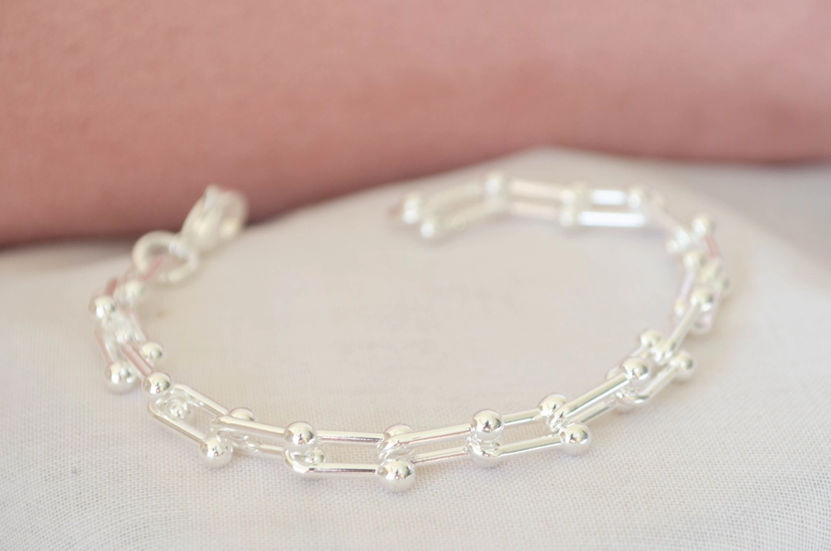 ABP0031 Pulsera eslabon rectangulos bolitas