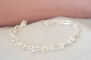ABP0031 Pulsera eslabon rectangulos bolitas
