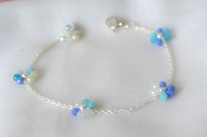ABP0039 Pulsera flores celestes
