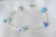 ABP0039 Pulsera flores celestes