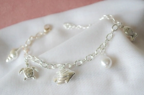 ABP0040 Pulsera tiffany con dijes
