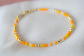 ADP0007 Pulsera bolitas cristales naranjas