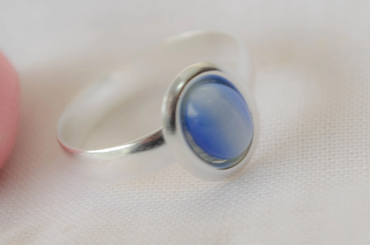L-AN0201 ANILLO perla oval  celeste