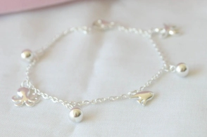 ABP0065 Pulsera fina con dijes y bolita -